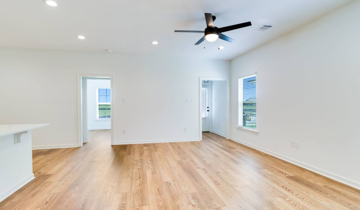 Ceiling fan above the living room of a model home at Cottages at Sugar Mill Pond in Youngsville, Louisiana