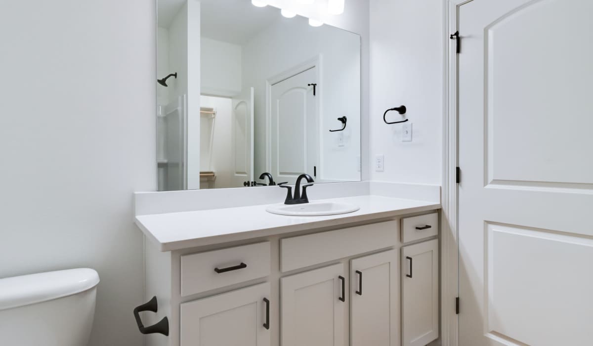 Luxurious bathroom in a model home at Cottages at Sugar Mill Pond in Youngsville, Louisiana