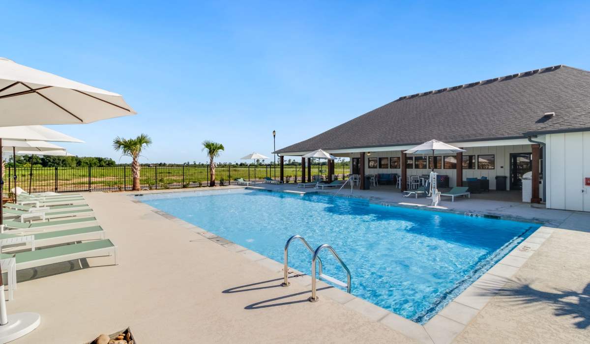 Sparkling swimming pool at Cottages at Sugar Mill Pond in Youngsville, Louisiana