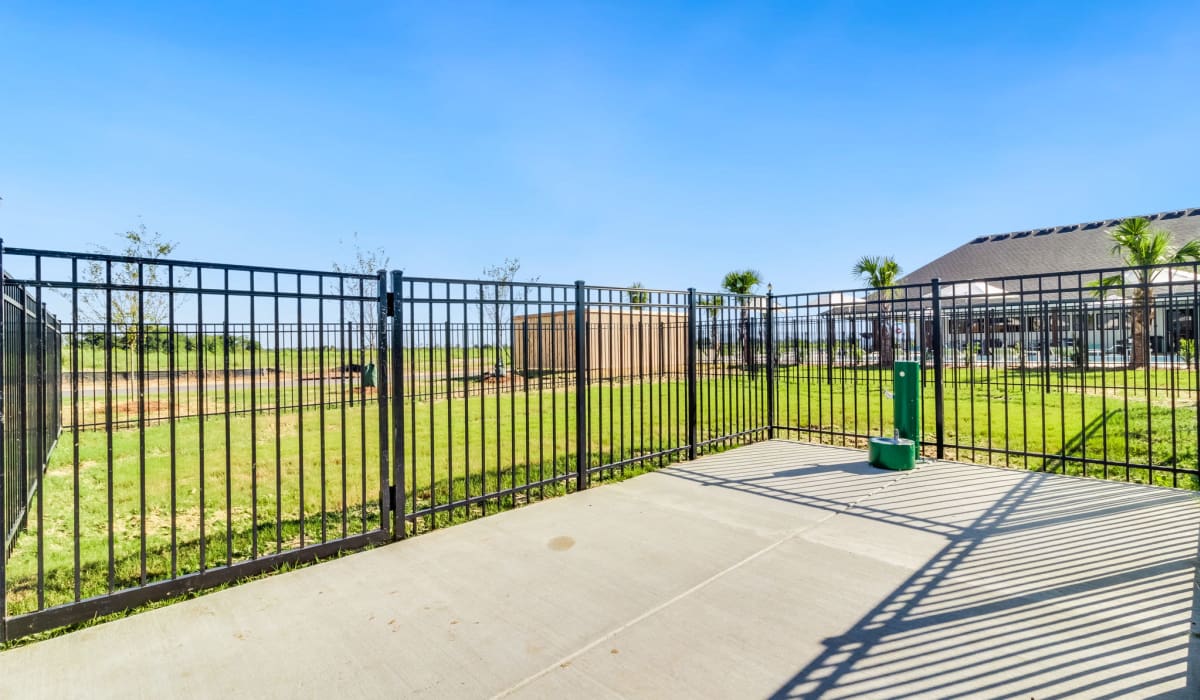 On-site dog park at Cottages at Sugar Mill Pond in Youngsville, Louisiana