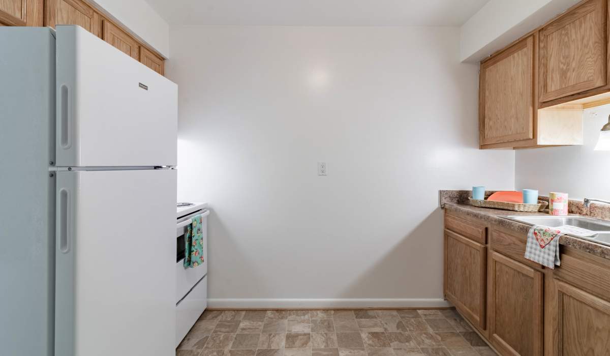 Model apartment kitchen angle 2 Country Club Apartments in Hampton, Virginia