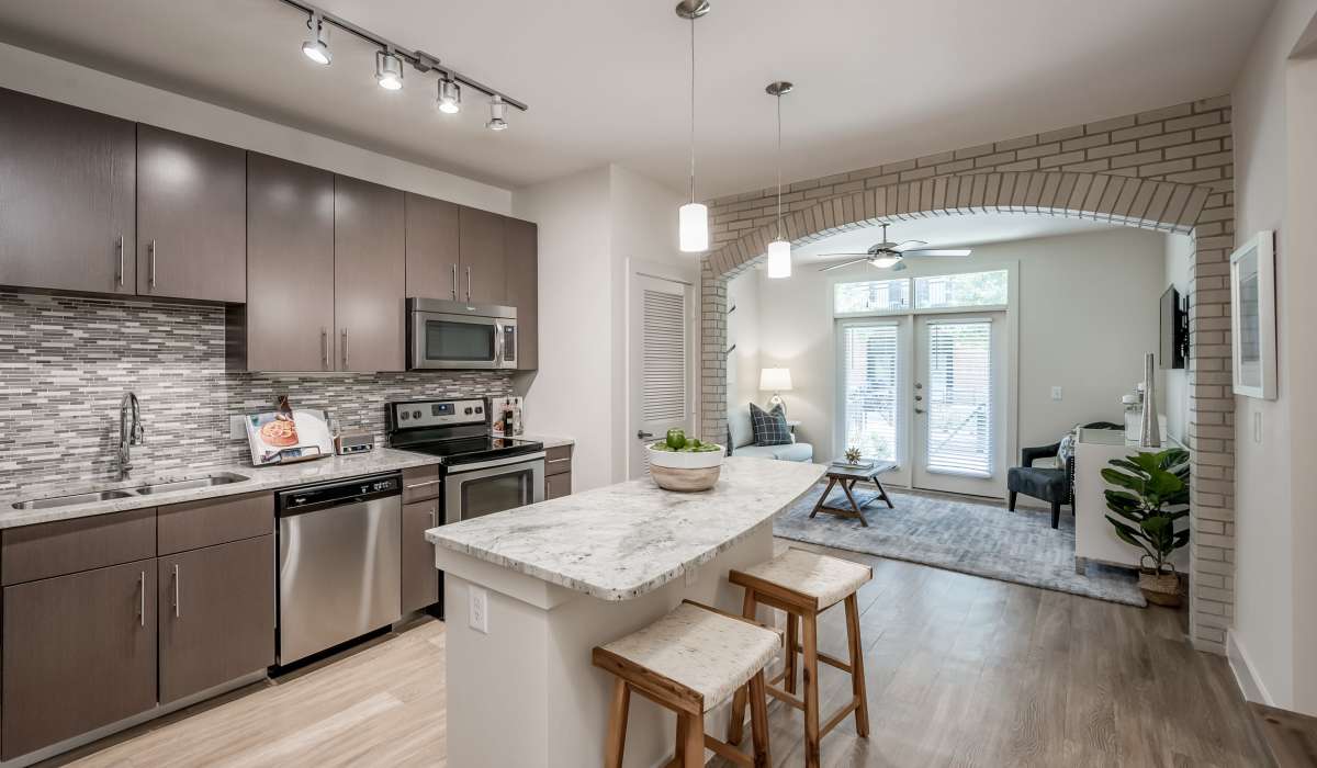 Large kitchen with island at Tate Tanglewood in Houston, Texas
