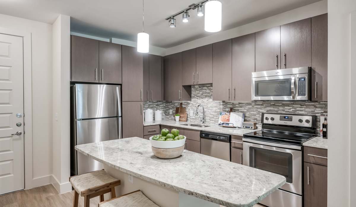 Kitchen with prep island at Tate Tanglewood in Houston, Texas