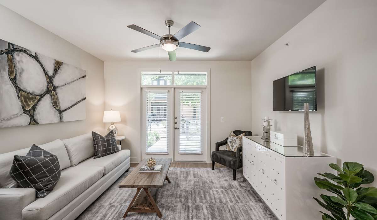 Living room with attached private patio at Tate Tanglewood in Houston, Texas