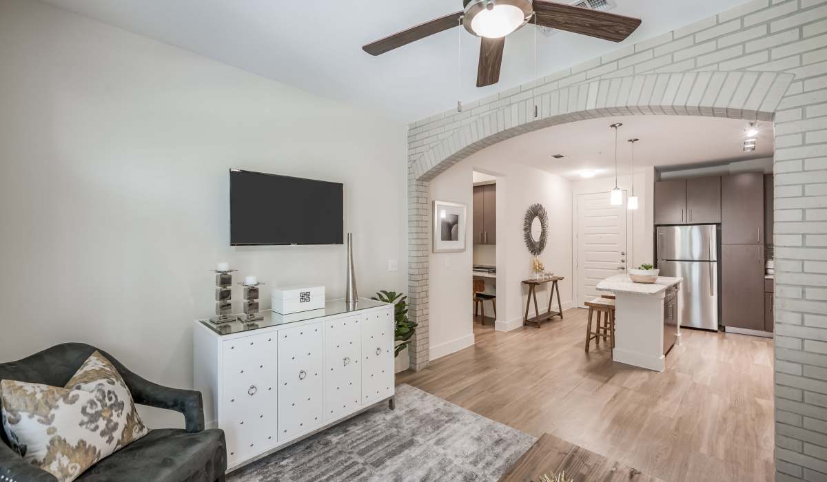 Living room attached to kitchen at Tate Tanglewood in Houston, Texas