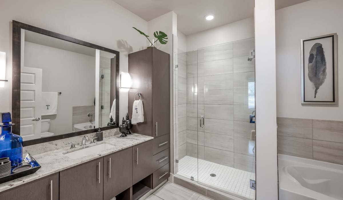 Bathroom with upright shower at Tate Tanglewood in Houston, Texas