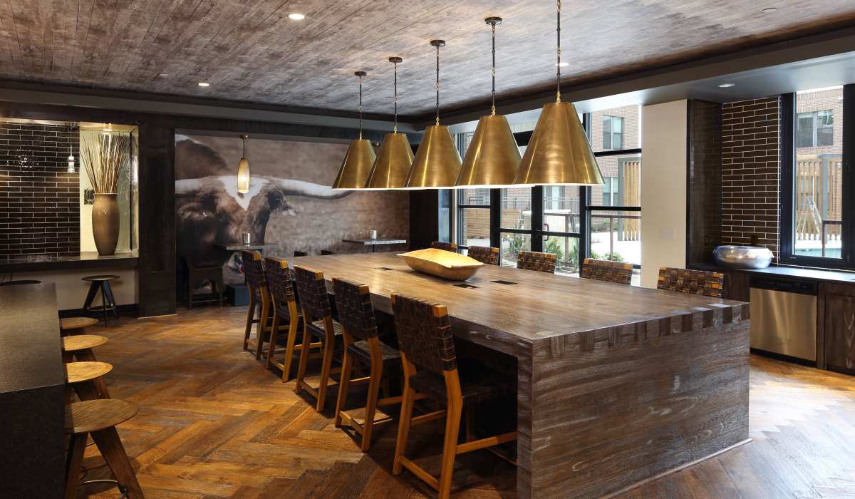 Luxury clubhouse with large meeting table at Tate Tanglewood in Houston, Texas