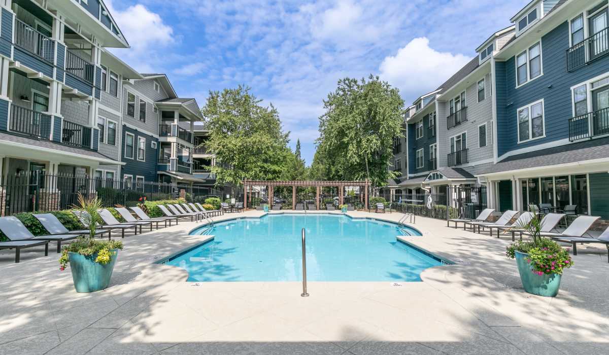 Swimming pool area at The Reserve at Johns Creek Walk in Johns Creek, Georgia