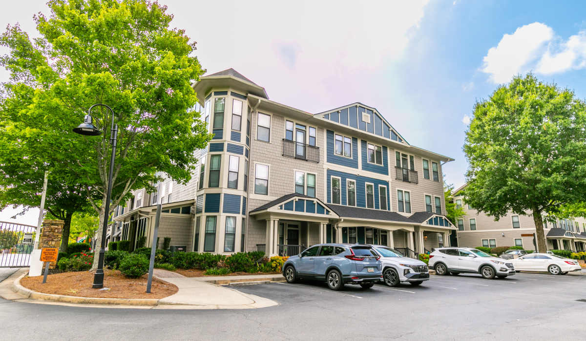 Building exterior at The Reserve at Johns Creek Walk in Johns Creek, Georgia
