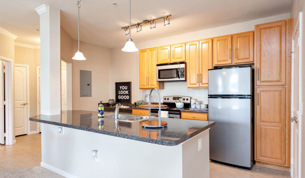Modern kitchen with with island countertop at Arch Street in Madison, Alabama