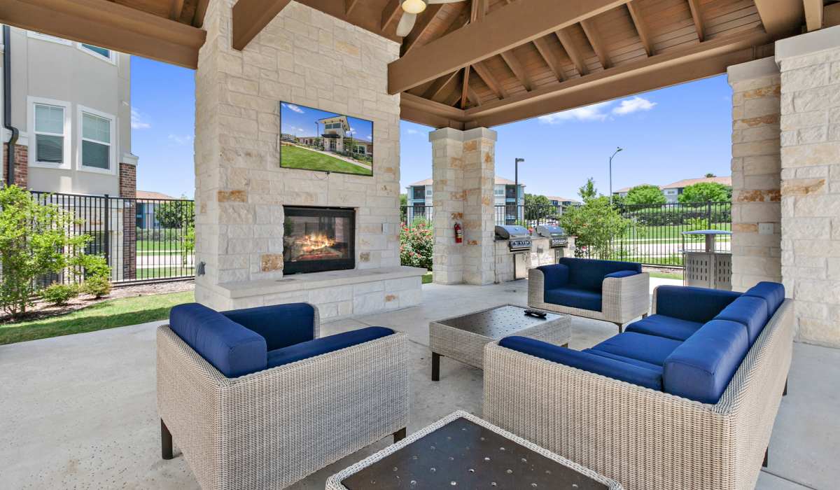Seating area with fireplace at Sadler House in San Marcos, Texas, 