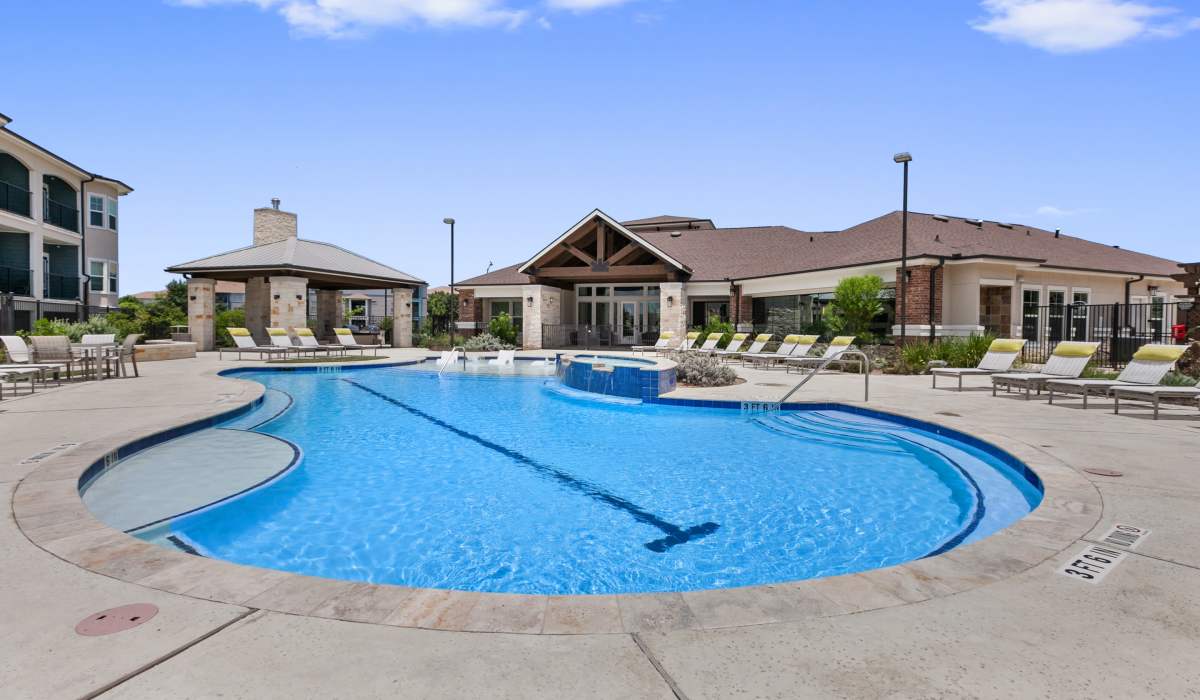 Sparkling water swimming pool at Sadler House in San Marcos, Texas, 