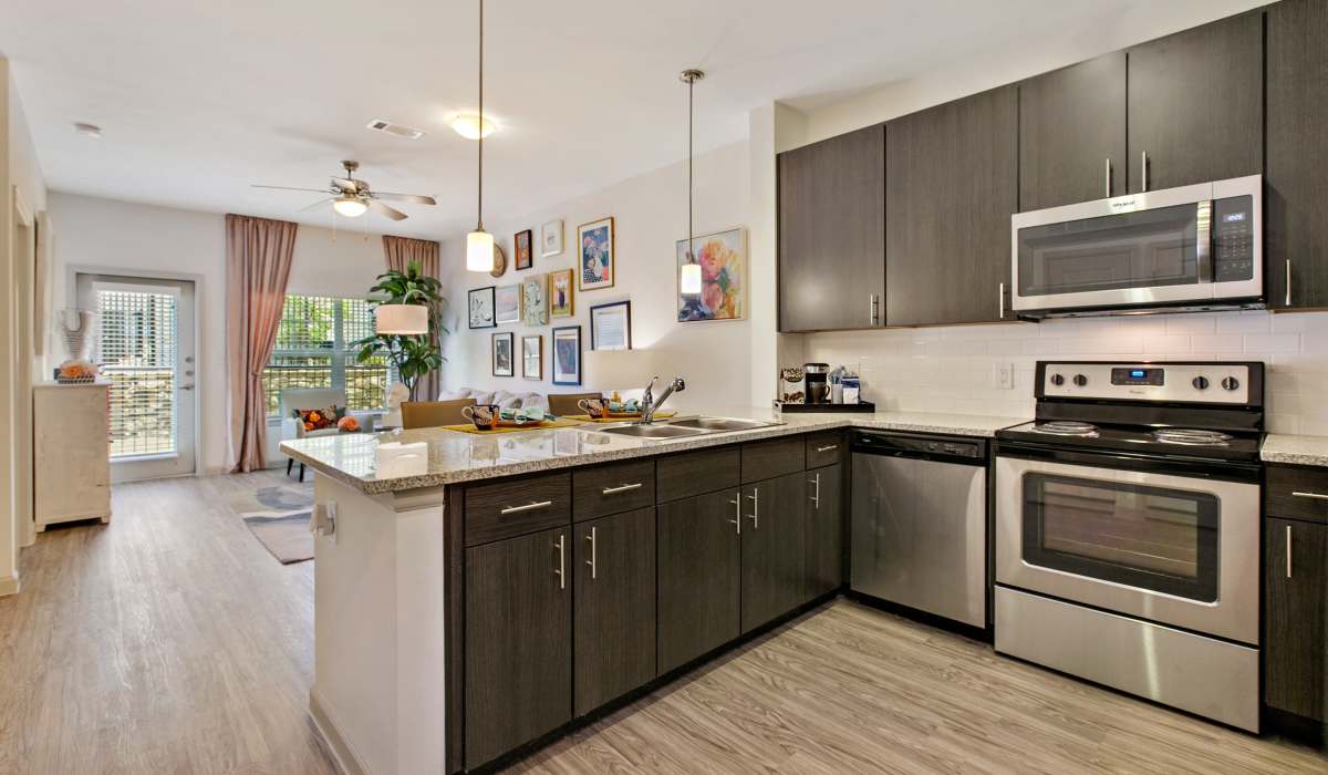 Open-concept living spaces at Sadler House in San Marcos, Texas, 