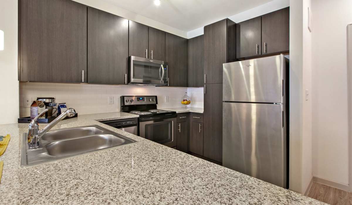 Stainless steel appliance kitchen at Sadler House in San Marcos, Texas, 