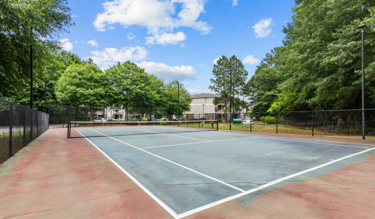 Community outdoor tennis court at The Grove on Southlake in Morrow, Georgia