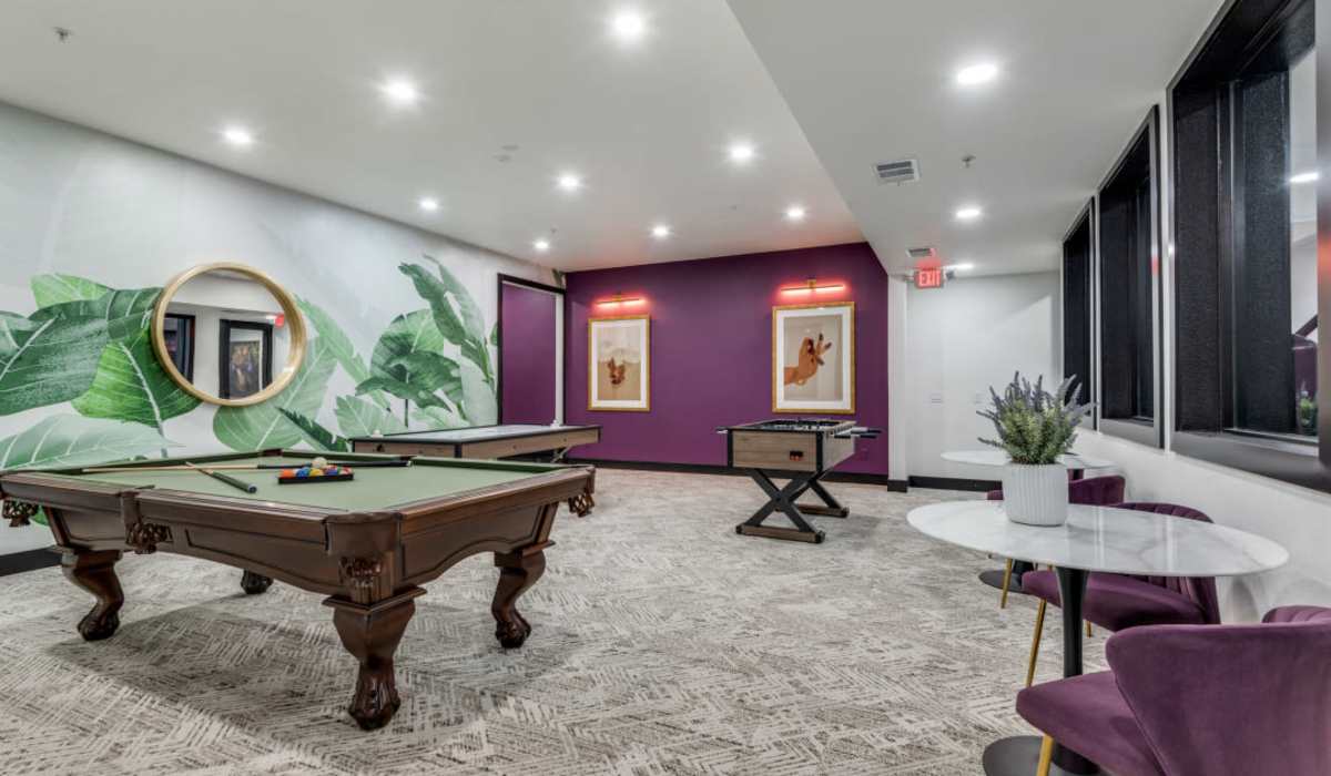 Clubhouse with pool table at Devi at Valley Ranch in Irving, Texas
