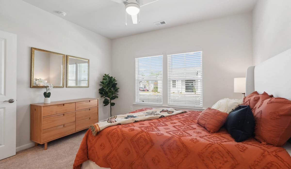 Well-lit bedroom with a bed at Reve Park Ridge in Little River, South Carolina