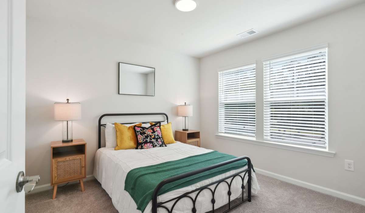 Bedroom with large windows at Reve Park Ridge in Little River, South Carolina