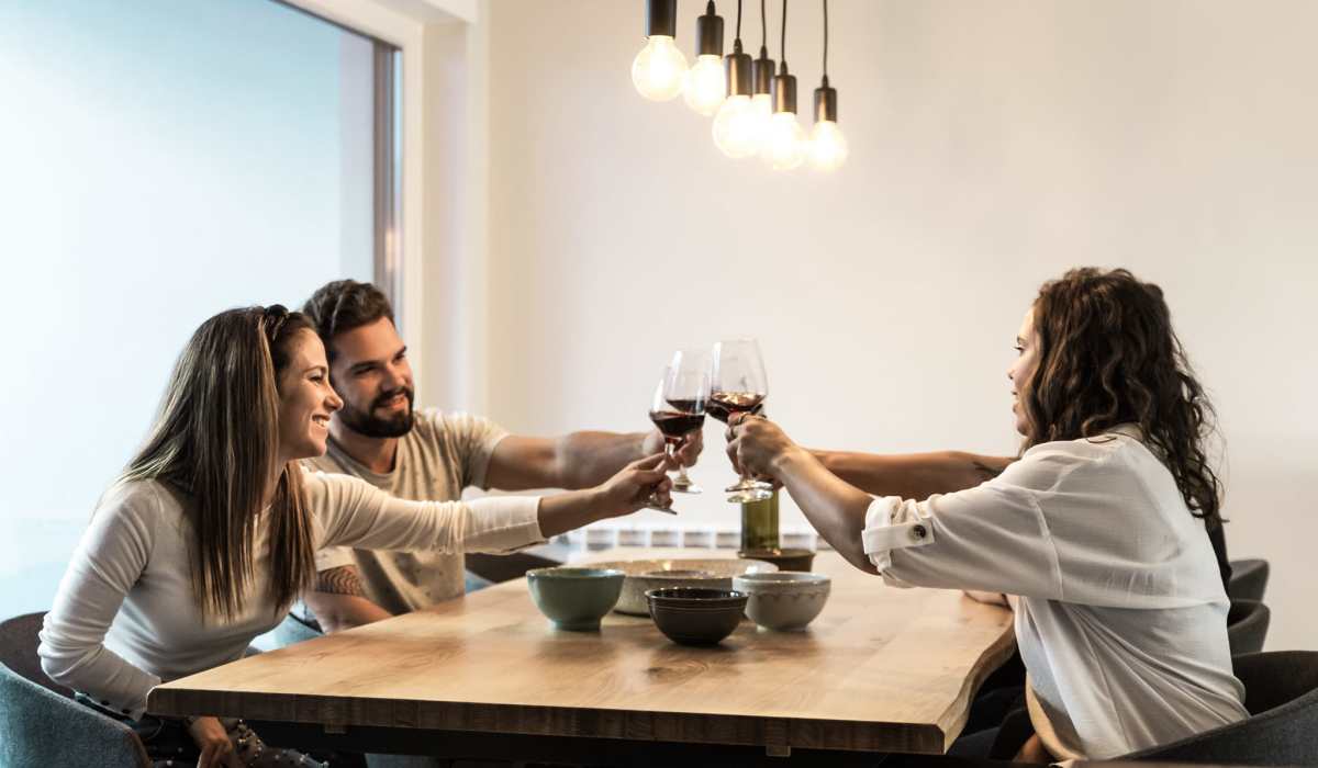 Resident playing with his kids in a park near The Residences at Sakura Novi in Novi, Michigan