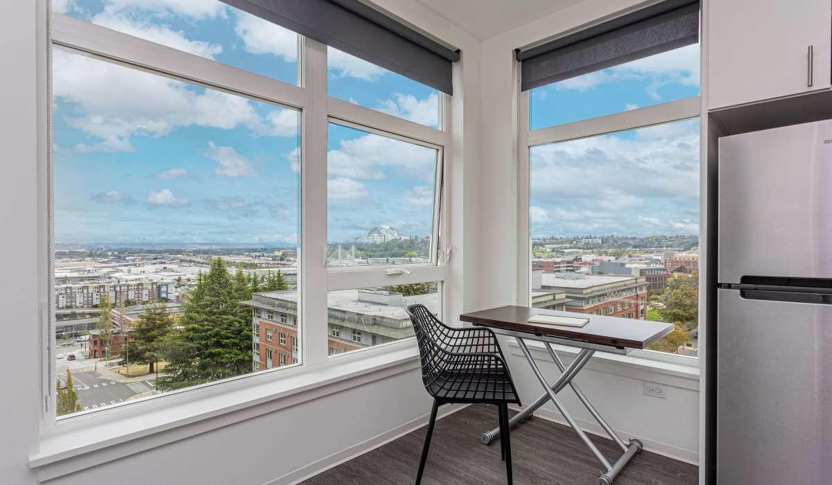 Dining area in an apartment at Koz on Market in Tacoma, Washington