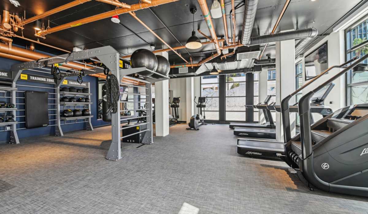 Fitness center with treadmills at Aster in Long Beach, California