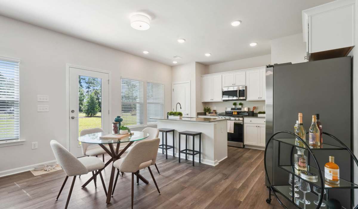 Dining area with a table and chairs at Reve Park Ridge in Little River, South Carolina