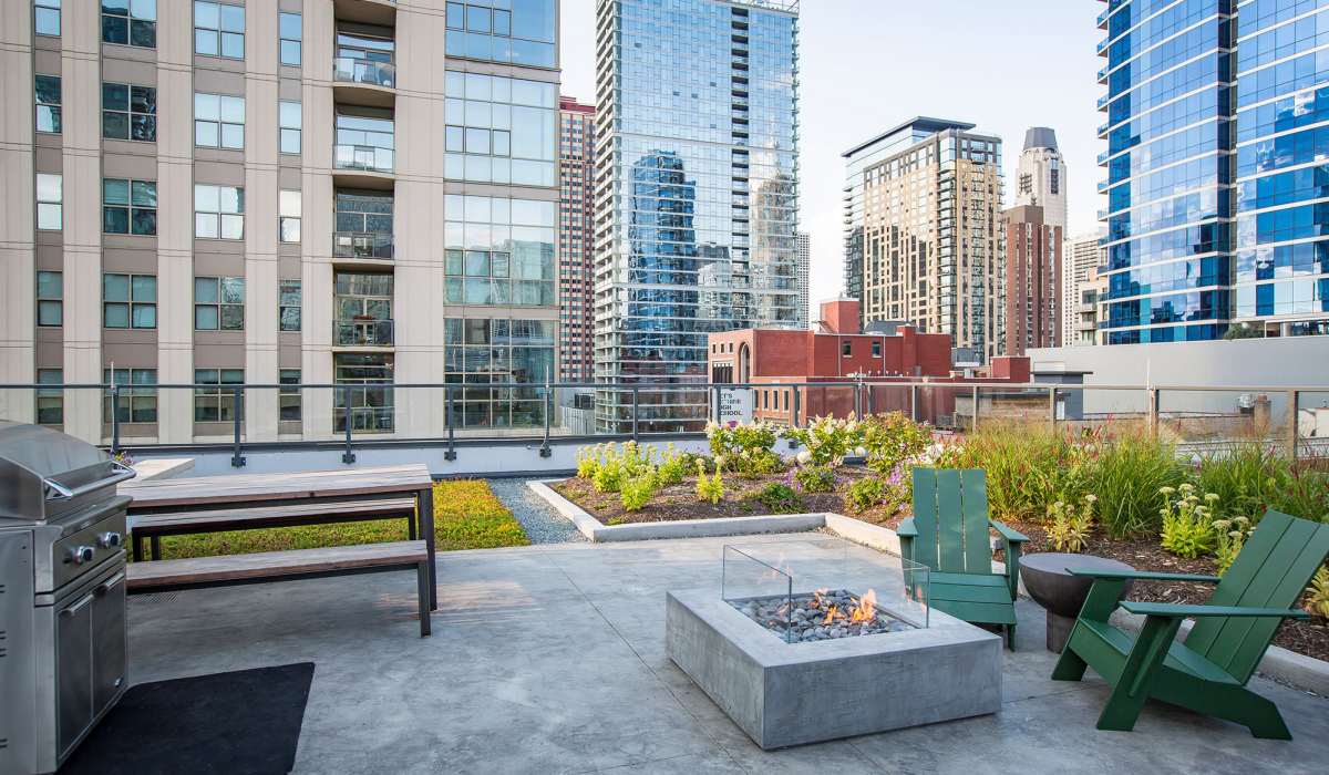 Outdoor deck with firepit at Exhibit On Superior in Chicago, Illinois