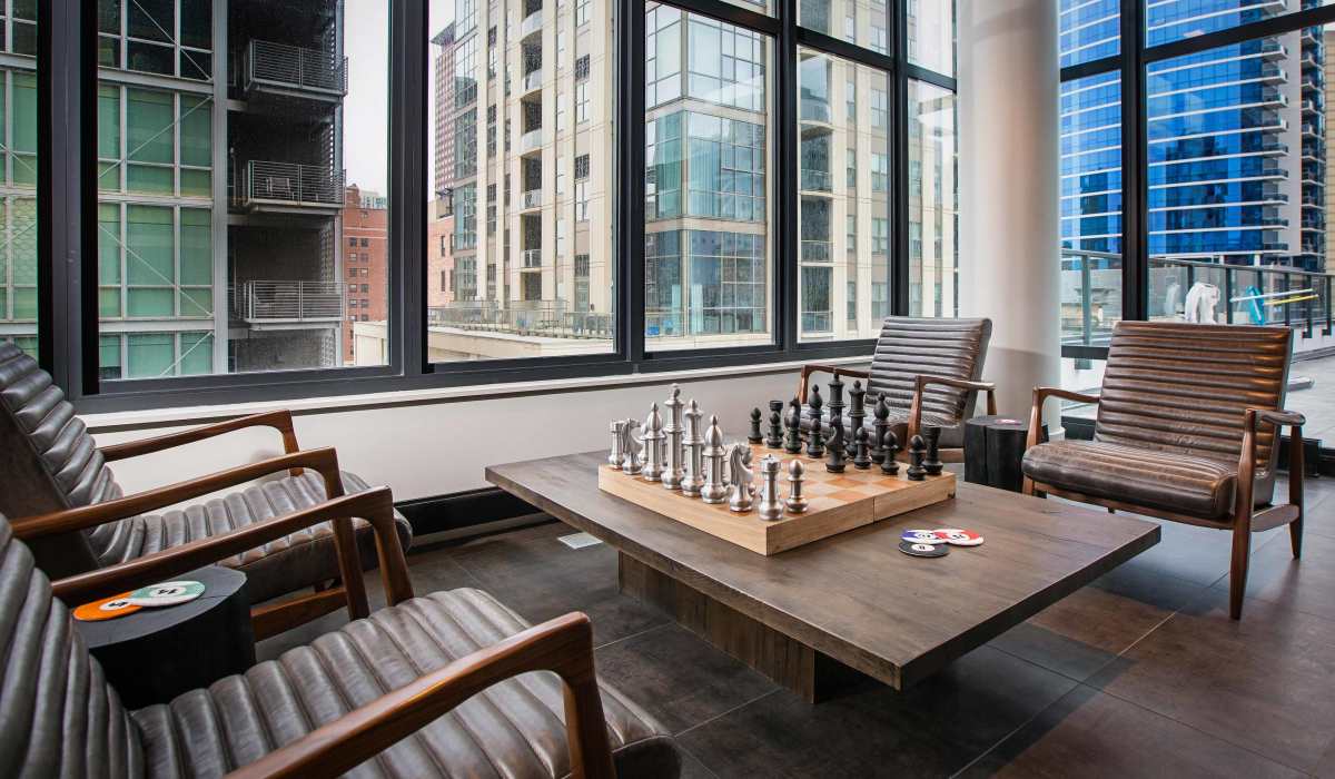 Chess in the resident lounge with great views at Exhibit On Superior in Chicago, Illinois