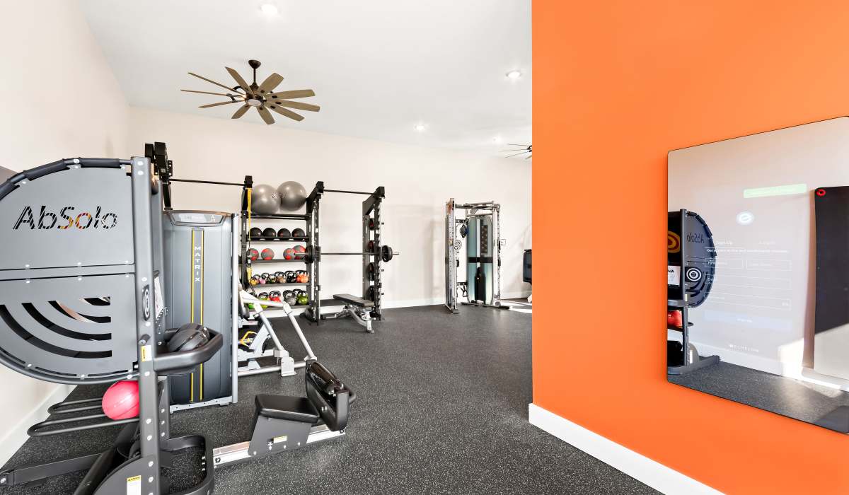 Fitness studio with treadmills and weight machines at Elevate at Topside in Louisville, Tennessee