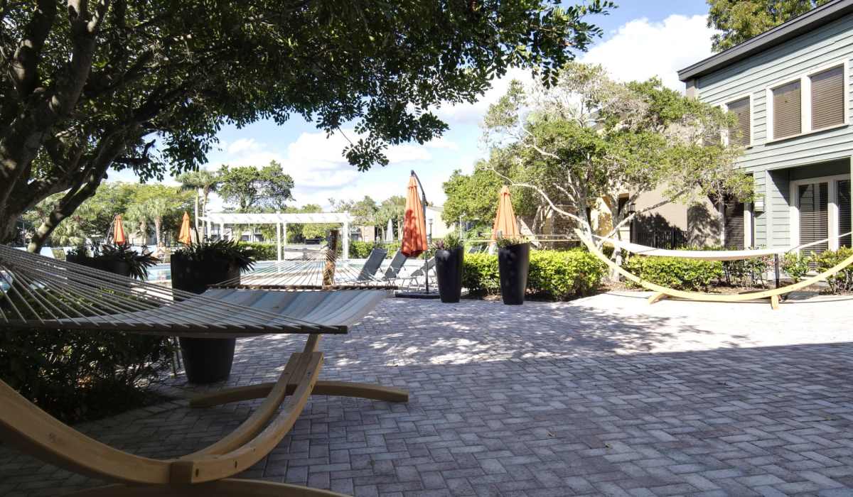 Hammocks by the pool at Fountains at Forestwood in Fort Myers, Florida