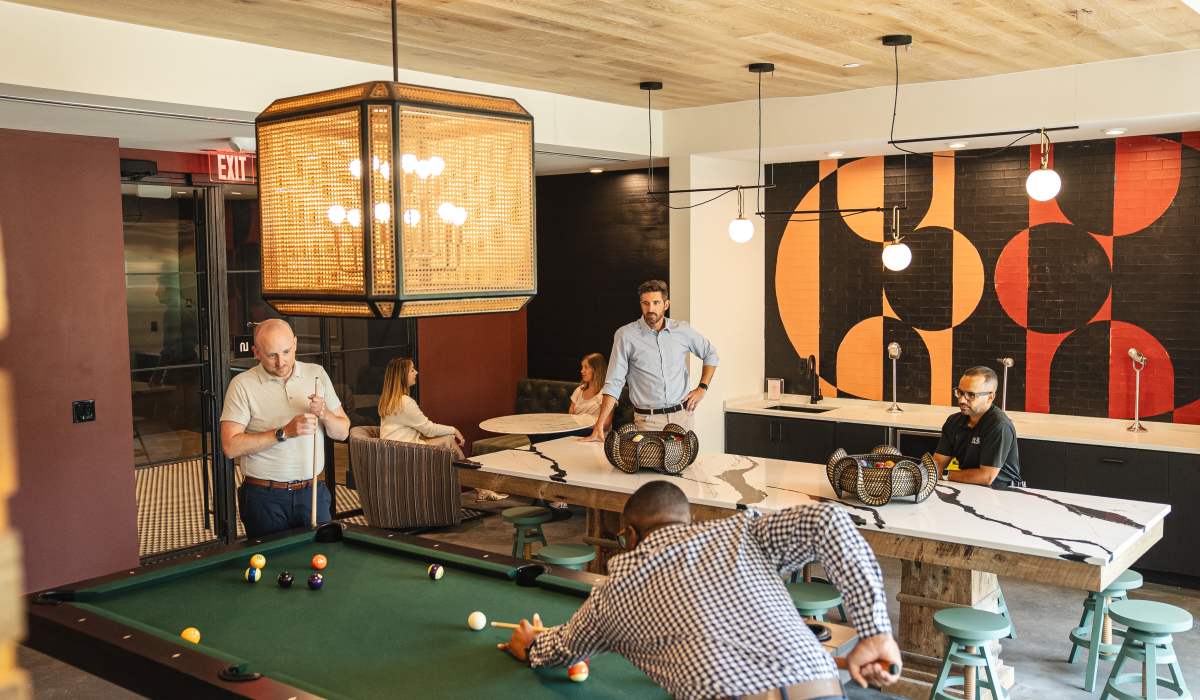 Residents playing pool at Channel House in Raleigh, North Carolina
