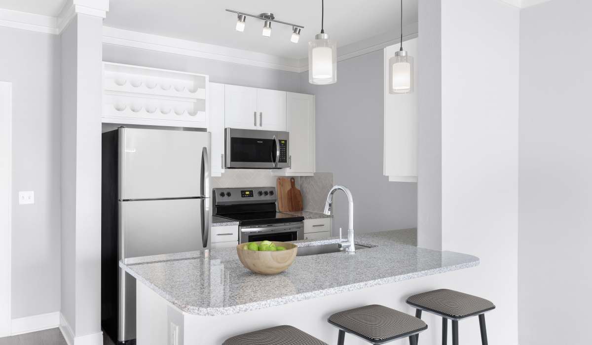 Spacious island kitchen at Vale Overland Park Apartments in Overland Park, Kansas,  