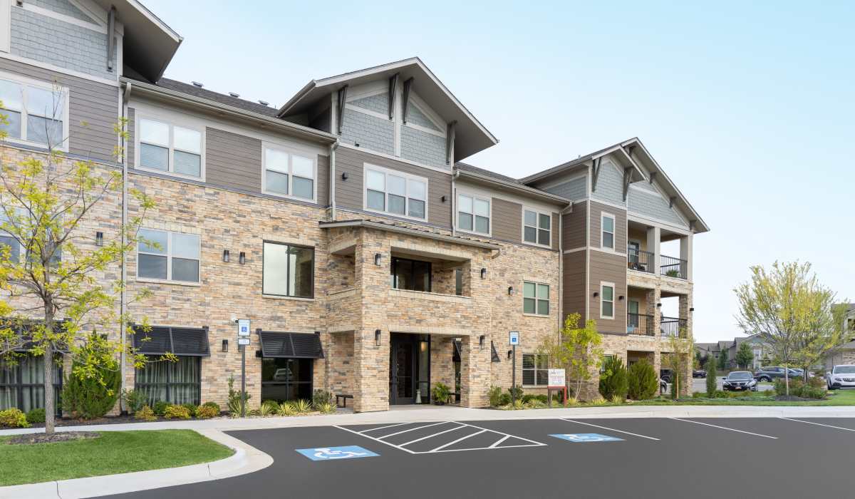 Lots of parking in the welcoming neighborhood at Vale Overland Park Apartments in Overland Park, Kansas, 