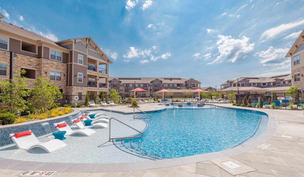 Sparkling water swimming pool at Vale Overland Park Apartments in Overland Park, Kansas, 