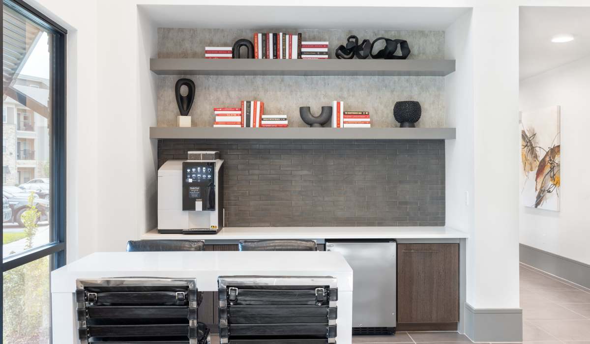 Club house with coffee bar at Vale Overland Park Apartments in Overland Park, Kansas, 