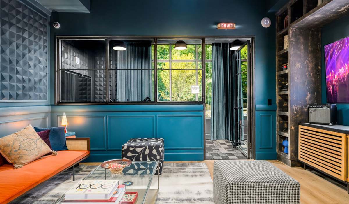 Media room with coffee table and sofa at Channel House in Raleigh, North Carolina