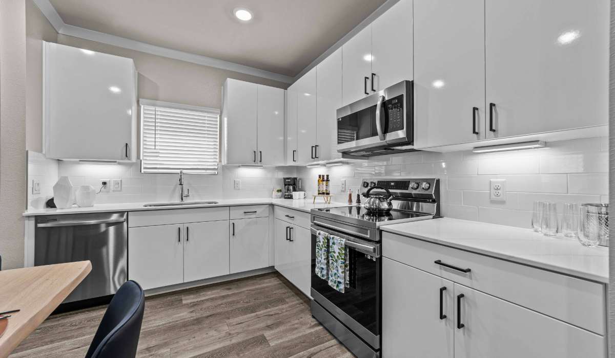 Stainless-steel appliances in a home at Estates Of Mckinney in Mckinney, Texas