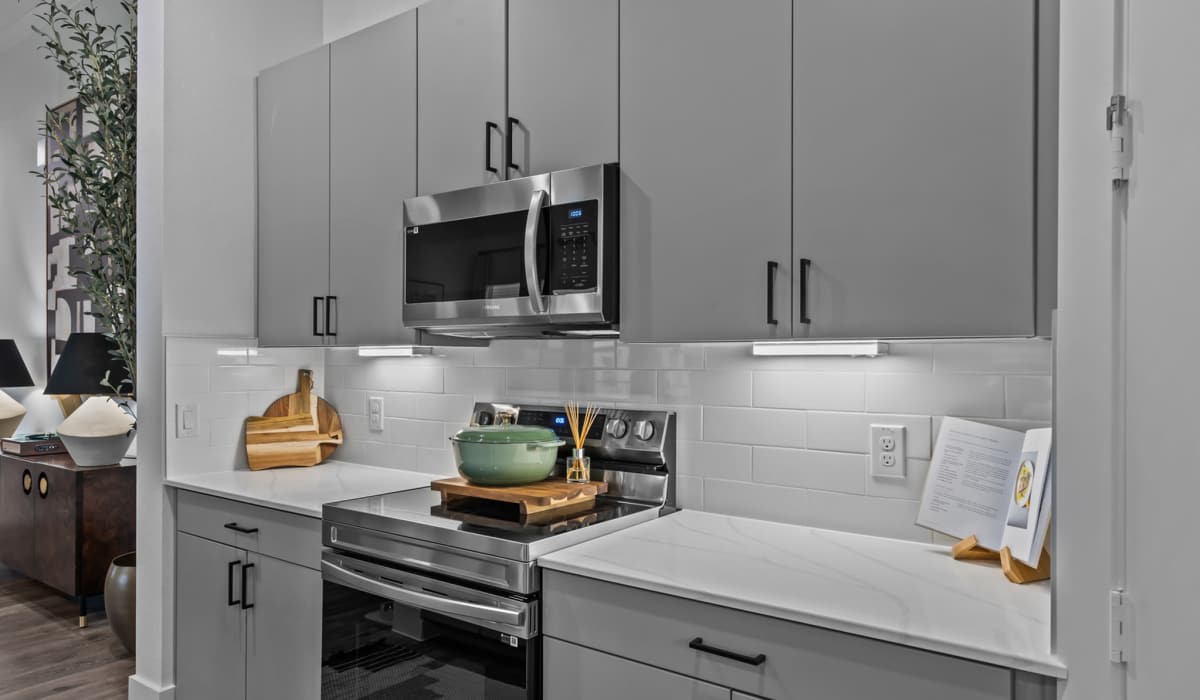 Stainless-steel appliances in a kitchen at Luxe Of Buda in Buda, Texas