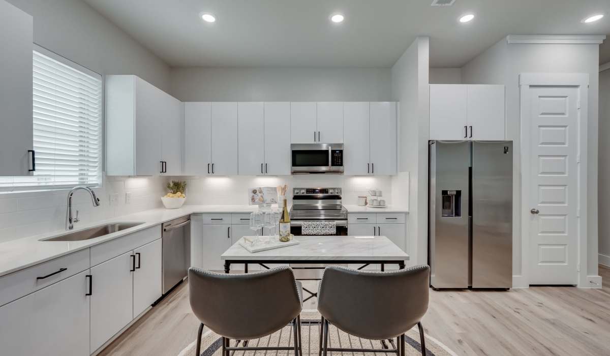 Apartment kitchen at The Luxe Of Prosper in Mckinney, Texas