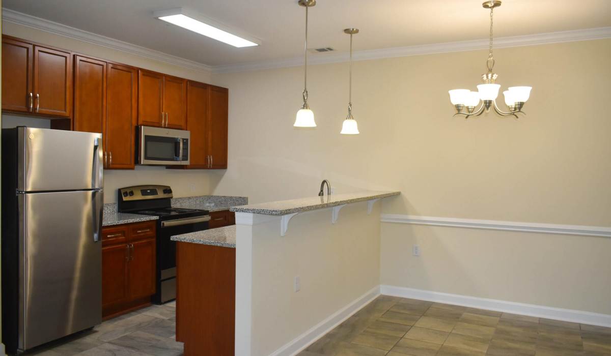 Open concept living spaces at Palisades of Fountain Inn in Fountain Inn, South Carolina, 
