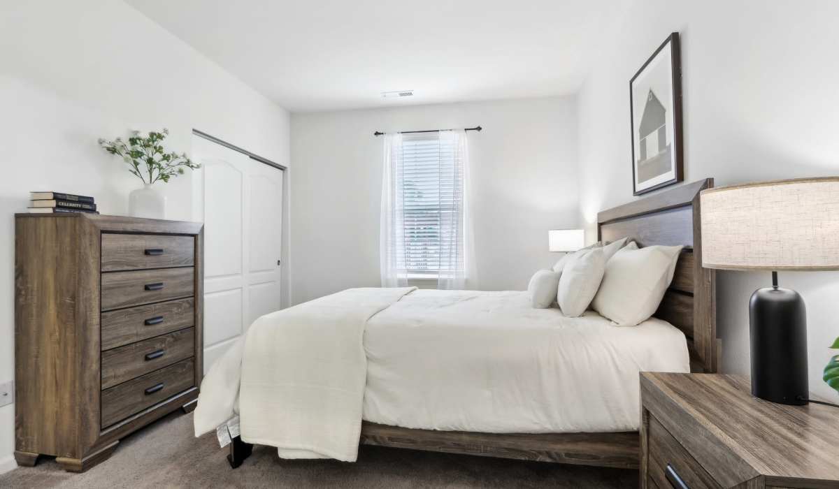 Bedroom with a window and storage units at Bluestone in Greenfield,Indiana
