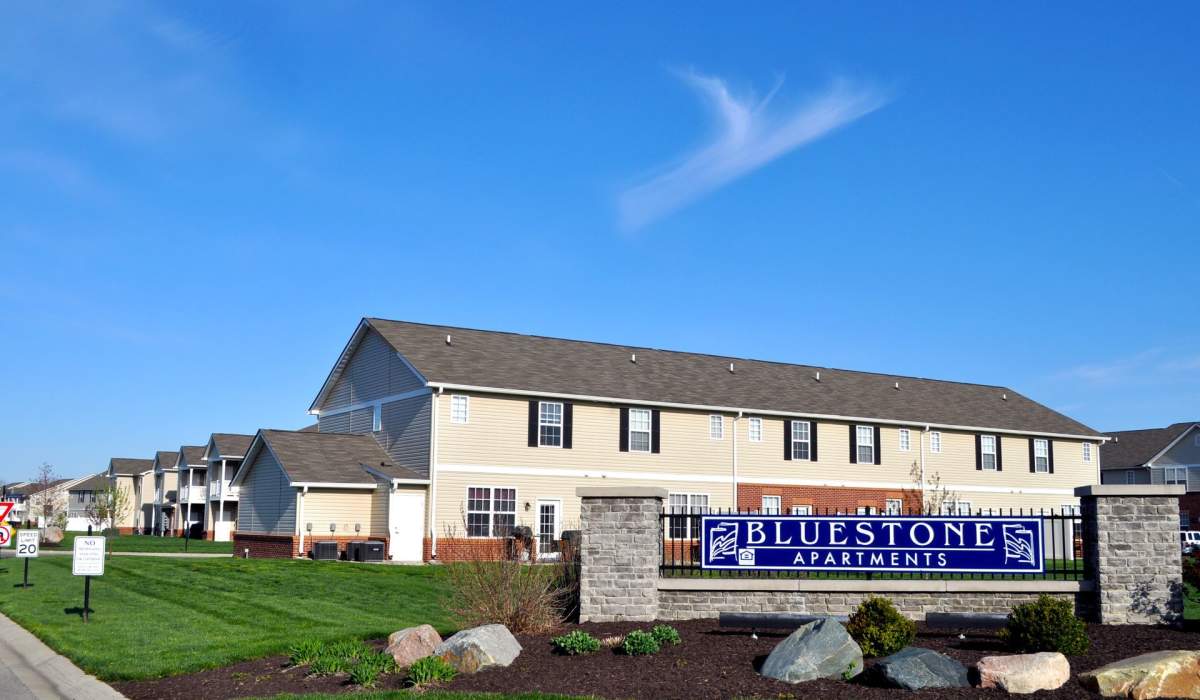 Property exterior with a sign board at Bluestone in Greenfield,Indiana