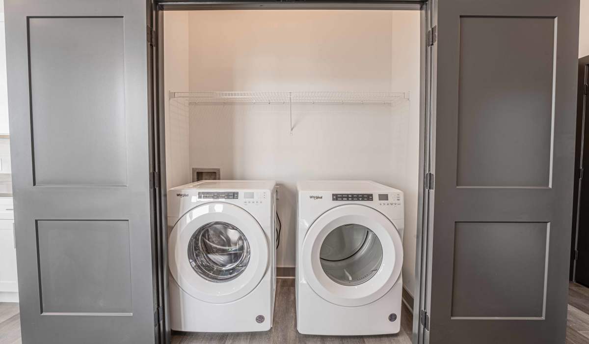 Laundry area at The Apartments at 1st on Main in Carmel, Indiana