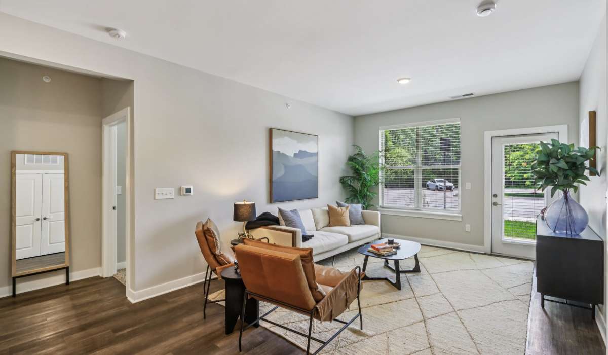 Well-lit living room at Founders Pointe Apartments in Franklin, Indiana
