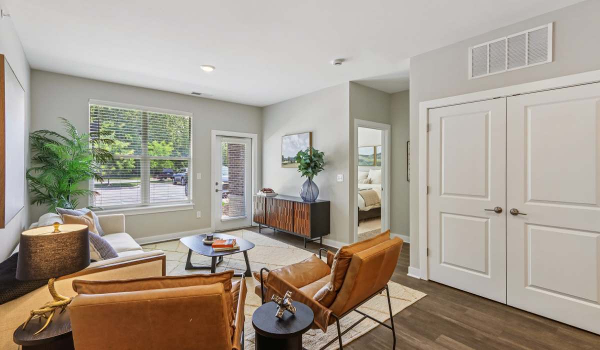 Well-lit living room at Founders Pointe Apartments in Franklin, Indiana