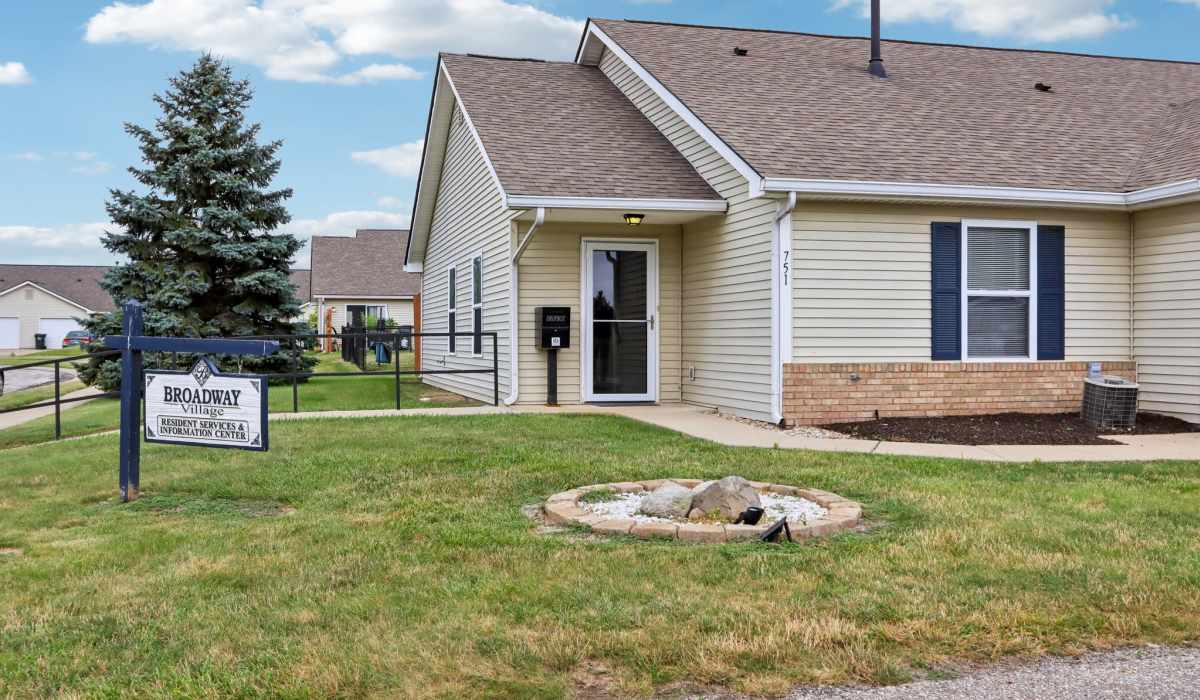 Apartments with property board at Broadway Village Apartments in Greenfield,Indiana