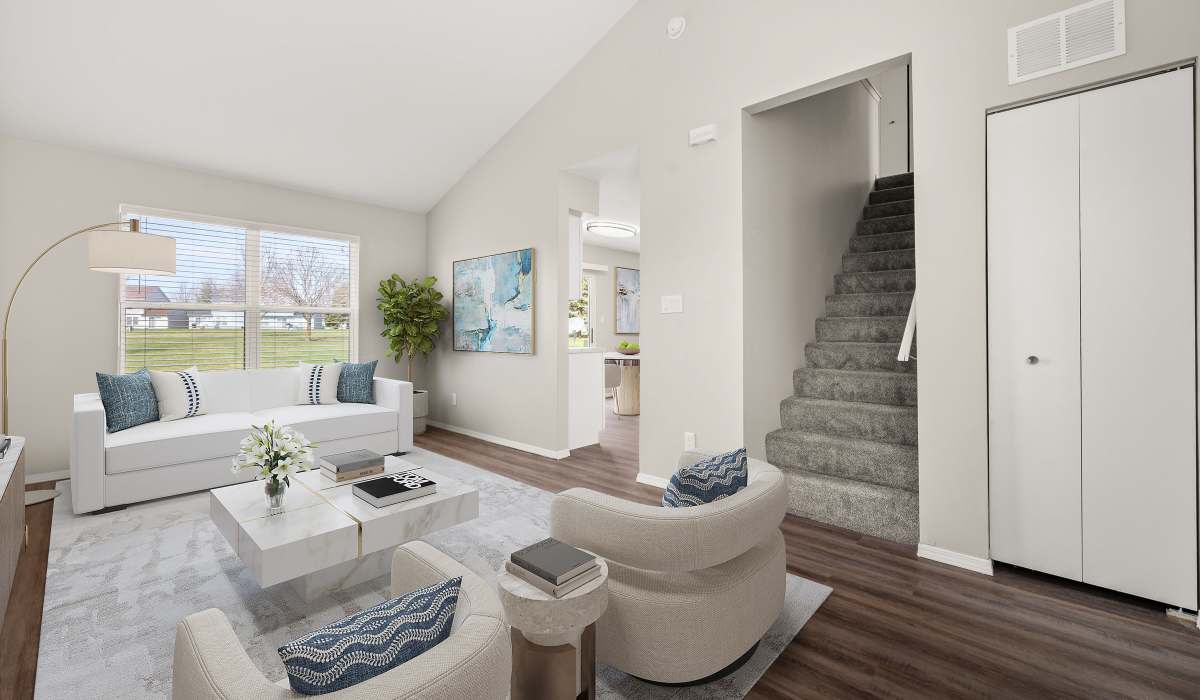 Spacious kitchen with white cabinets at Meadowlark Townhomes in Dekalb, Illinois