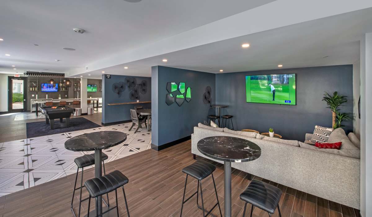 seating in the sports lounge at The Dylan Apartment Homes in Hercules, California