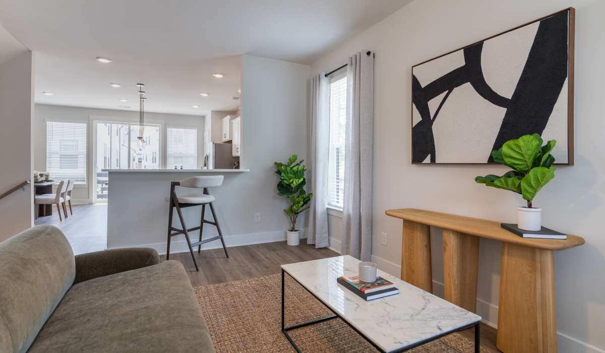 Open layout kitchen with dining table at Maybrook Terraces in Greenville, South Carolina