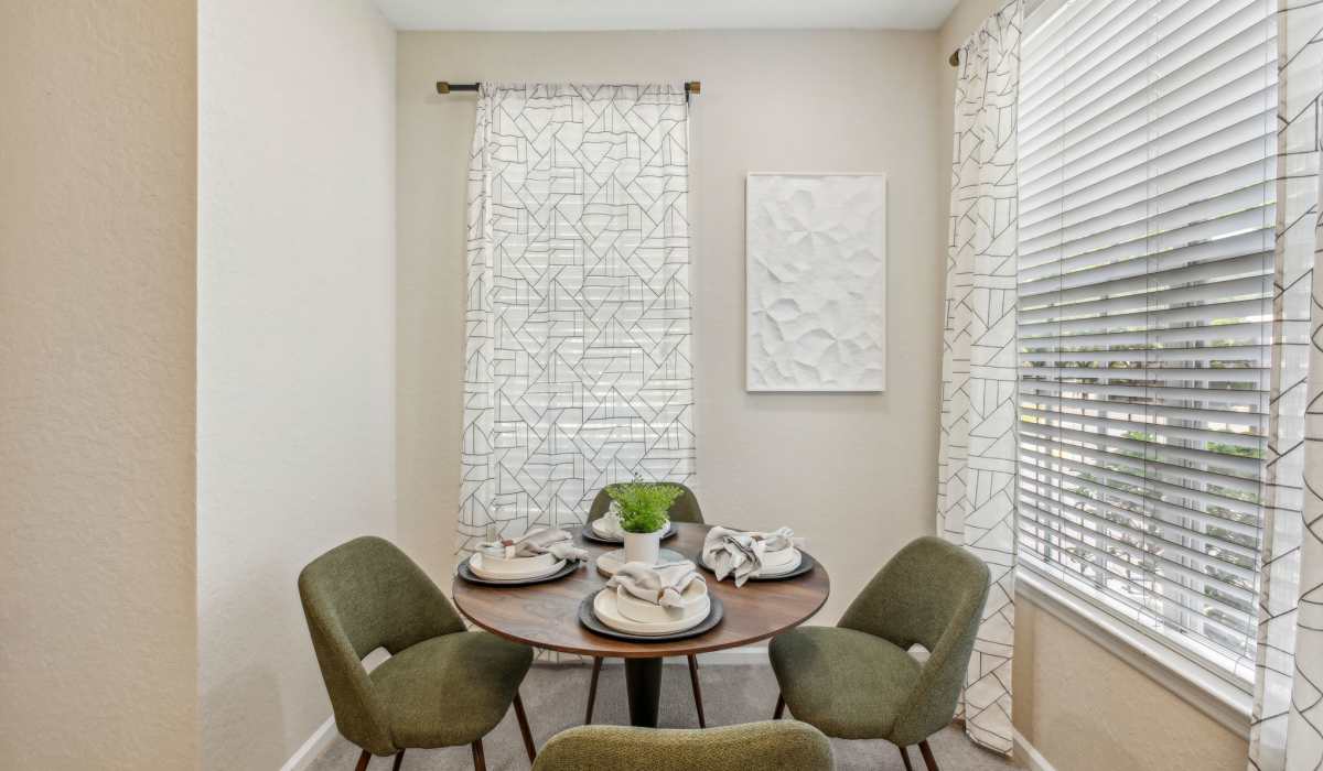 Spacious dining room with large windows at Sole at Citrus Park apartments in Tampa, Florida